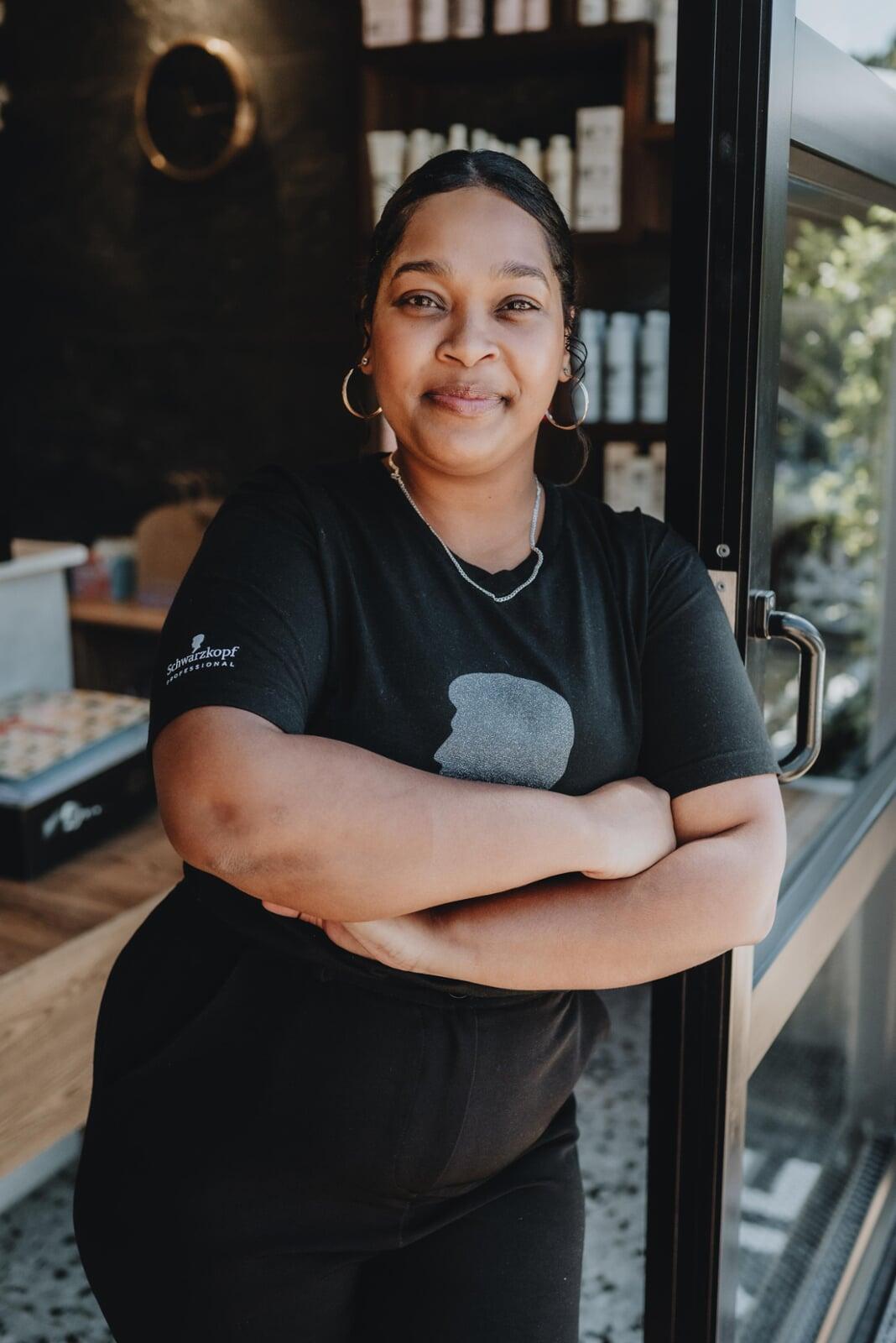 Shaundre washing hair at 178 On Mane Hair Salon