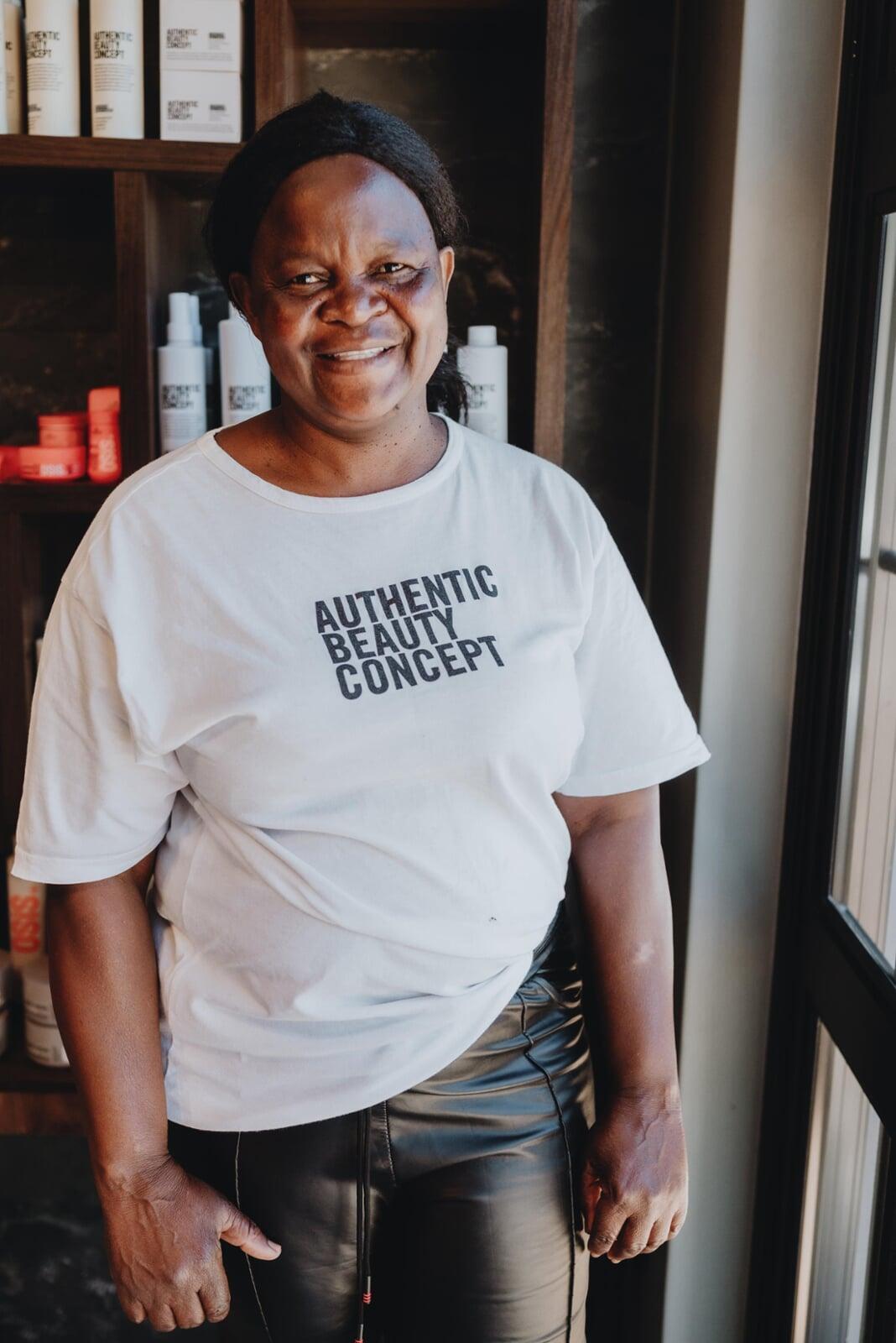 Shaundre washing hair at 178 On Mane Hair Salon