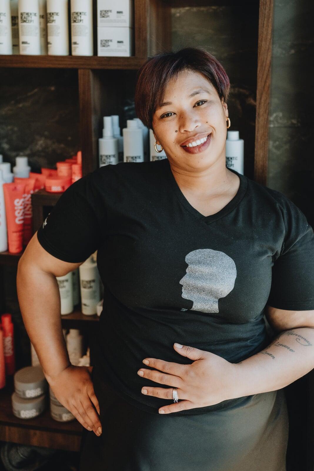Shaundre washing hair at 178 On Mane Hair Salon