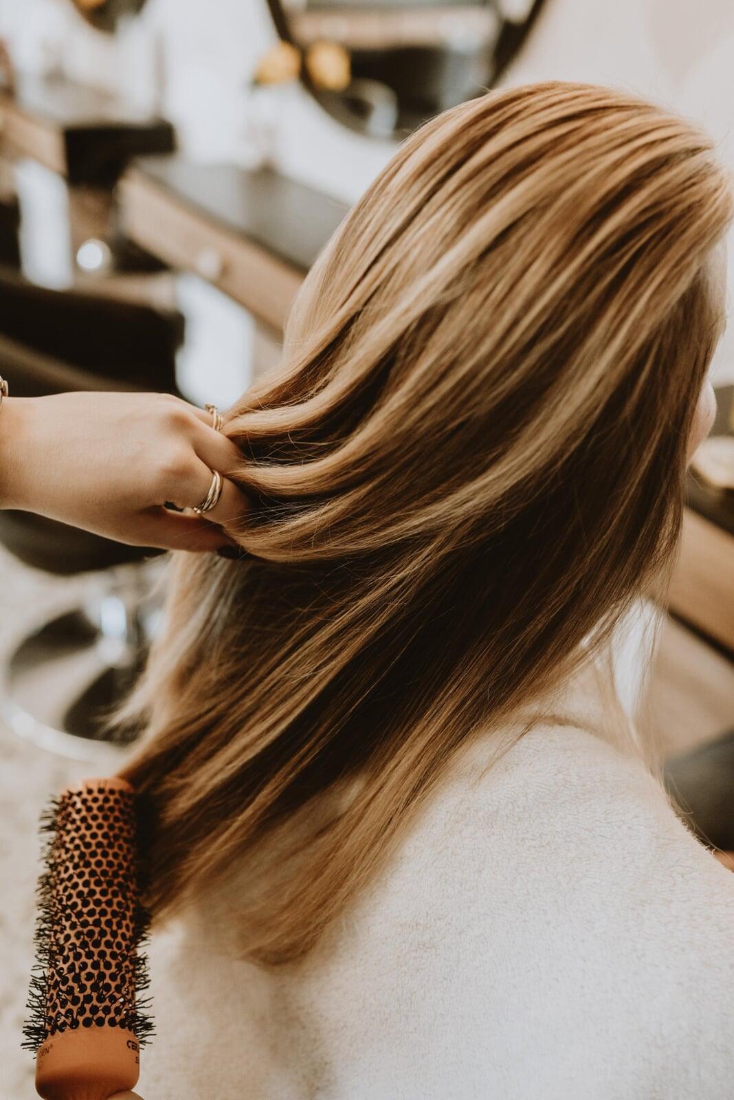 An image if mimosas next to nail extensions