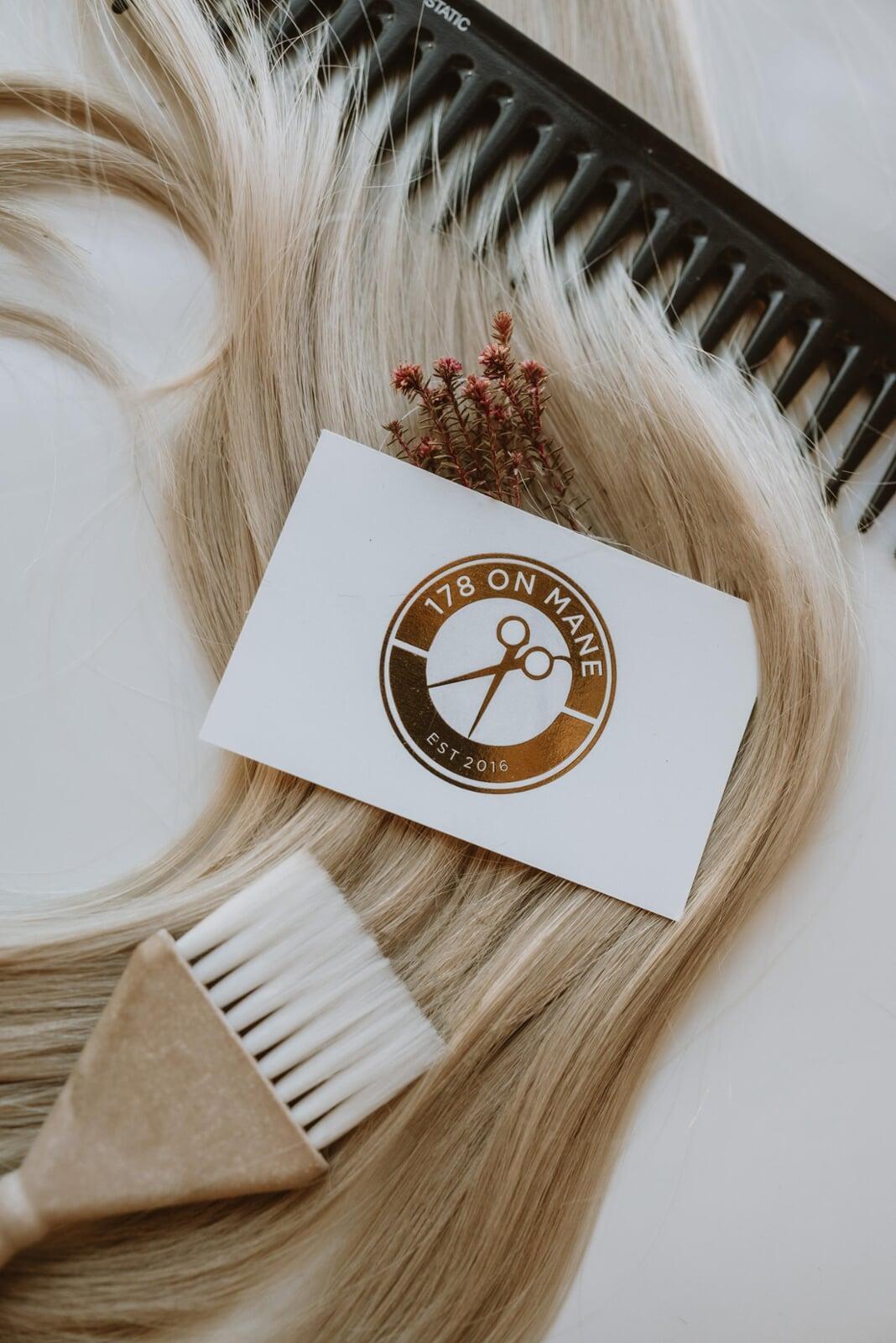 Image of a mimosa next to nail extensions